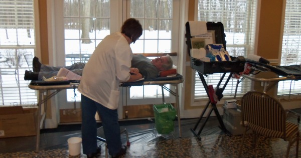 Dale Mathes giving blood at the Community Center today
