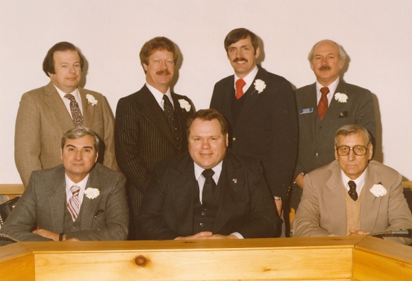 Members of the first Auburn Hills City Council. Top Row (left to right): David Jerrell, Larry Douglas, Michael Davis, and Ronald Shirley. Bottom Row (left to right): E. Dale Fisk, Mayor Robert Grusnick, and Mayor Pro-Tem Walter Smith (Special thanks to Tyson Brown, President of the Auburn Hills Historical Society for this photo)